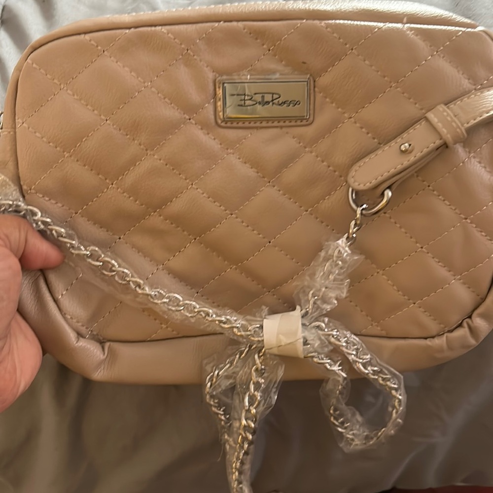 Woman’s purse leather brand new tan with chain strap